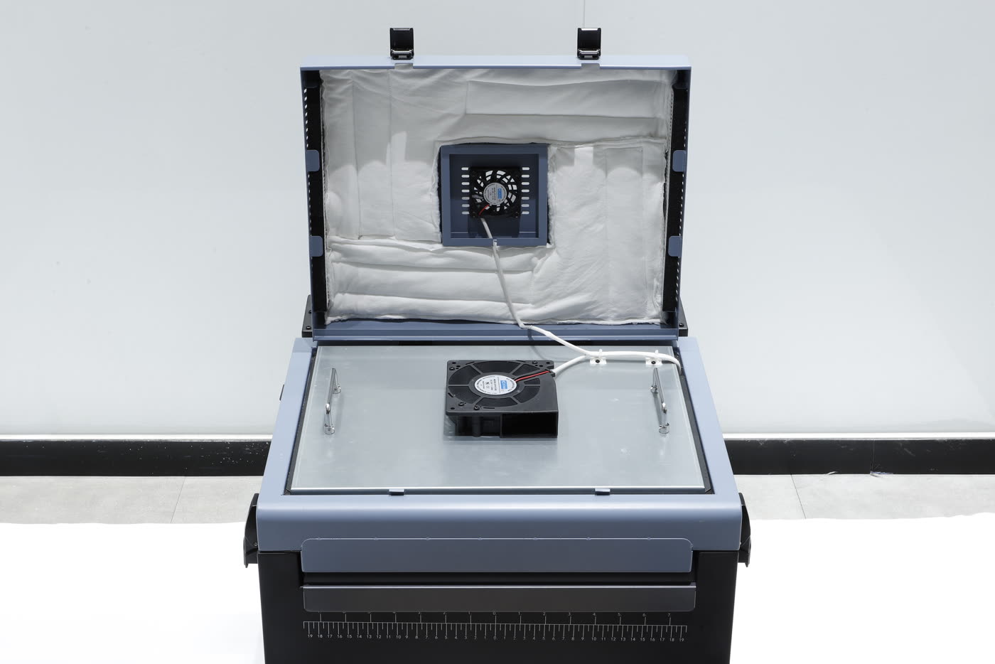 The Miro 13 Max with its lid open, showing the curing plate and extraction fan
