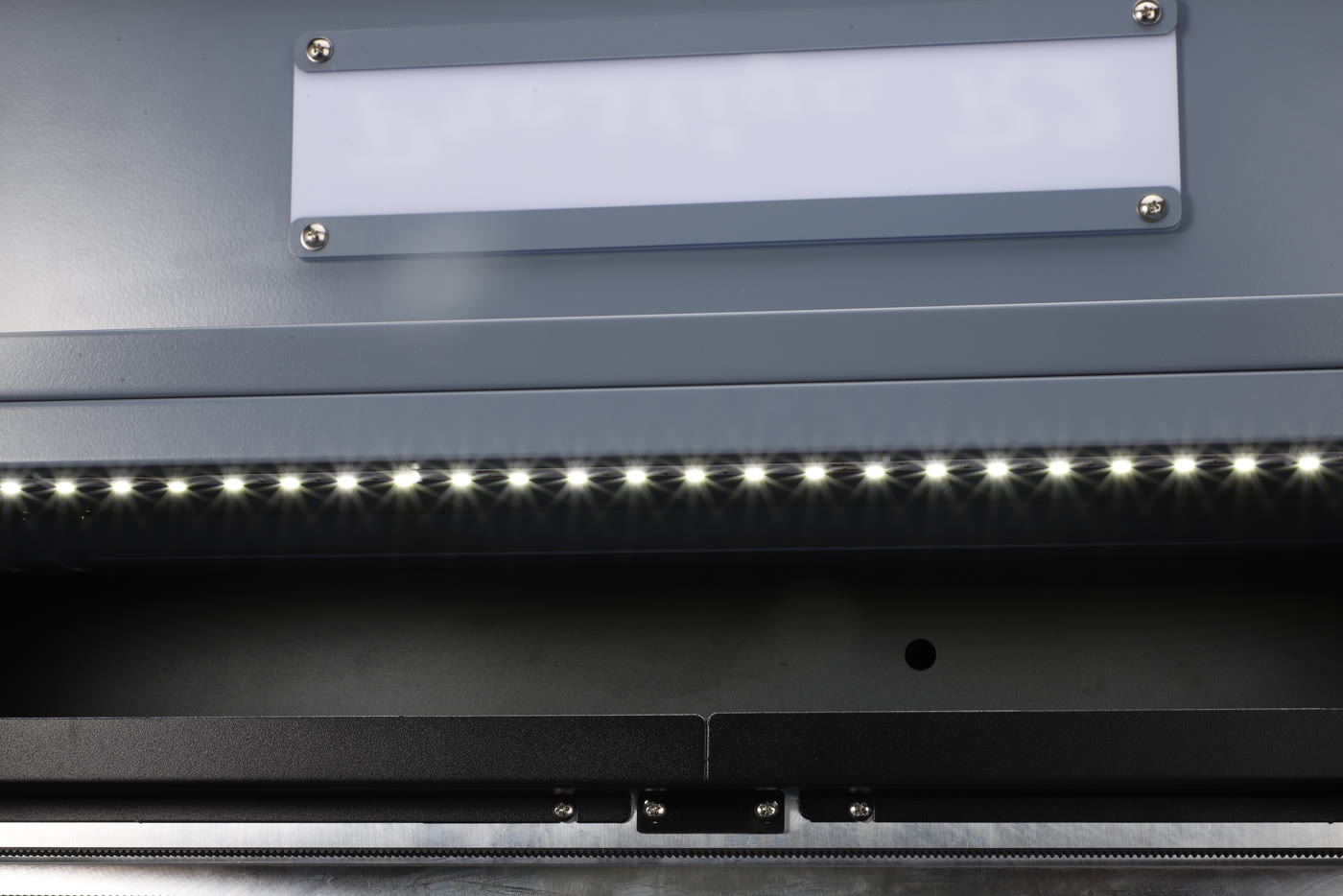 The lit nameplate of a Prestige R2 Pro
